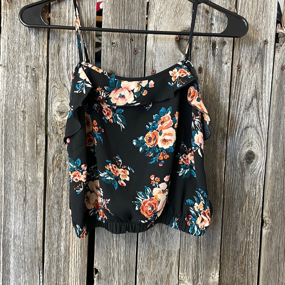 Floral blouse with adjustable straps and elastic waistband